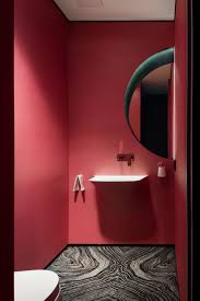 Bold colors work best in small portions. Yuriy Zimenko Covers A Ukraine Apartment In Bold Colors Bathroom Paint Design Bathroom Color Small Bathroom Interior