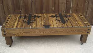 Extra Long Pallet Made Into A Bench Coffee Table Designed After A Castle Door Coffee Table Bench Coffee Table Pallet Coffee Table