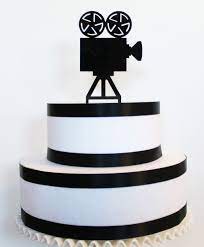 These include sprinkle mixes, wafer paper designs, cake kits, cake toppers , cupcake toppers, freeze dried fruit, chocolate art decorations these baby booties are ideal for topping your baby themed cakes and desserts. Movie Camera Cake Topper Camera Cake Topper Acrylic Cake Topper Themed Cakes