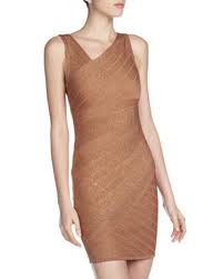 Put on a black blazer over this patterned gray dress. What To Wear To A Dinner Party Glamour