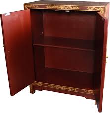 The method adds an exotic element to furniture, ornaments and objects, and the paint can be applied to wood, metal or terra cotta. Oriental Furniture Red Lacquer Cabinet Amazon Co Uk Home Kitchen