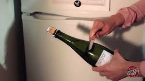 Remove the foil and wire cage—hold the bottle firmly at the bottom, loosen the wire cage. Saber A Champagne Bottle With A Spoon Champagne Bottle Open Champagne Bottle Champaign Bottle