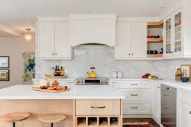 Whether you're in the mood for a glossy, modern look, or you want to keep things rustic with distressed wood, you can use the color white to emphasize your personal style and character. White Or Wood What S The Most Timeless Choice For Kitchen Cabinets Karen Fron Interior Design Calgary