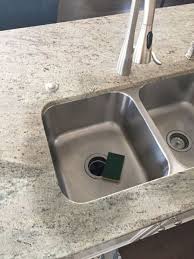 Better off replacing the countertop and cutting a new hole the correct size. Granite Stain Around Sink Cutout Granite Marble Granite Sink