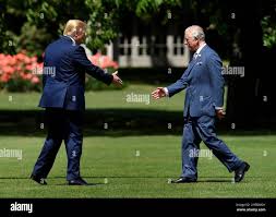 Britain's Prince Charles, right, meets ...