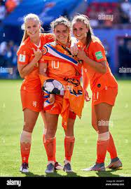 Netherlands' Kika van Es, Netherlands' Danielle van de Donk and  Netherlands' Lieke Martens (left to right) celebrate their win after the  final whistle Stock Photo - Alamy