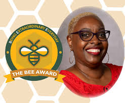 Congratulations to Monique Williams, Patient Access Clerk in  Cardiopulmonary, who was recently presented with the BEE Award! The BEE  Award honors exceptional team members who go above and beyond for “Being  Extraordinary