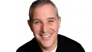 Author profiles Joe Nuxhall, Reds' longtime radio analyst, who also pitched  for Cincinnati at age 15