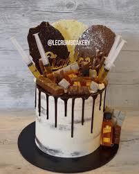 A Little Change To My Usual Jack Daniels Cake Replaced With Bundaberg Rum Need A Cake Contact Us T Christmas Cake Designs Party Desserts Jack Daniels Cake