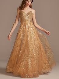 Bride in a wedding dress and highheeled sandals sits on a sofa in the room. Dsjys5nsvjukcm