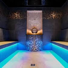 This stylish steam room has white corian benches and large format tiles to the walls. Klafs Sauna Steam Bath Infrared Sanarium Sauna Manufacturer Spas And Well Being