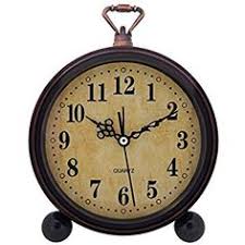 Pick a quirky print round glass and resin piece. 17 Small Clocks Ideas Clock Small Clock Table Clock