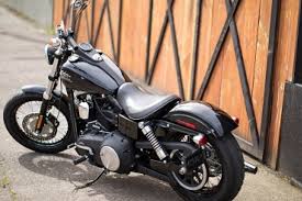 A street bob consists of little more than the basic components of a motorcycle: Harley Davidson Dyna Street Bob Dark Custom 2015 Motorcycles Photos Video Specs Reviews