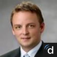 Dr. Travis A. Holt, MD