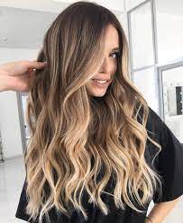 Bei vielen nuancen stechen die zwei ähnlichen farben sich. 1001 Stylische Ideen Fur Braune Haare Mit Blonden Strahnen