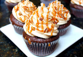 First time trying to decorate cupcakes 'nicely' so to speak! Chocolate Turtle Cupcakes With Caramel Buttercream Frosting