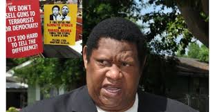 Lawmaker wants federal investigation into Obama gun show signs