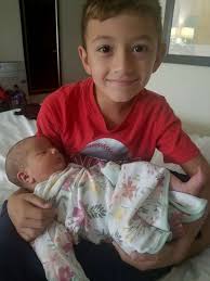 Mom battling COVID-19 gives birth after evacuating Hurricane Ida