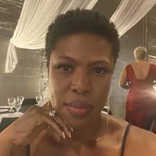 Jariell Jones said Adana Dean initially approached her nephew and the  family's 2-year-old pit bull, Dice, asking to pet the dog. She told Dice he  was a good boy and eventually left.