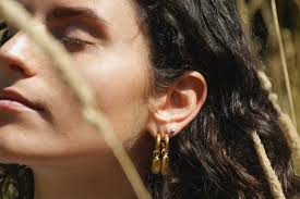 The best ethical and sustainable golden hoops to buy now
