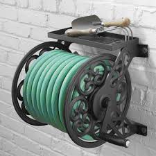 This particular hanger once hung in an old philadelphia building on north broad street. Watering Equipment Cast Iron Antique Design Wall Mounted Hose Holder Garden Water Hose Reel Stand Garden Patio Peppermilk Eu