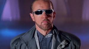 George Carlin Rufuksena elokuvassa Bill & Ted's Excellent Adventure (1989).  Rooli tarjottiin alun perin Arnold Schwarzeneggerille, mutta hän  kieltäytyi. : r/80s