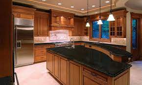 Kitchen w maple cabinets with cherry stain and mocha glaze uba tuba granite tumbled marble backsplash wall color. Uba Tuba Granite Countertops Pictures Cost Pros Cons