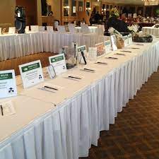 Learn how to get started planning a silent auction and try some of these various tips, themes and ideas to help raise money for your organization. Harris House Swing For Recovery Silent Auction Set Up Silent Auction Display Silent Auction Spring Fundraiser