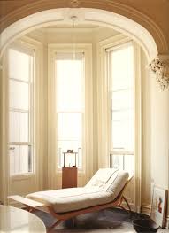 If you're lucky, your sill is low enough to add a cushion and pillows and call it a window seat. Great Ways To Dress A Bay Window