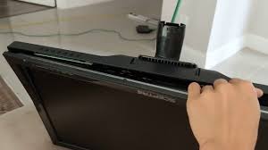 You have to remove first the cover, to do that, you need to have 4 pieces of thin metal to insert on those blue arrows to lift the latch of the cover, once inserted, you can then remove the cover without destroying its latch. How To Remove Neck Base And Stand On Sceptre E24 Monitor Youtube