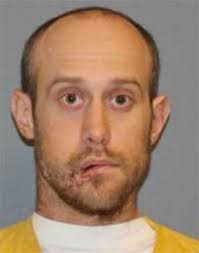 Man shot by police charged with 11 felonies