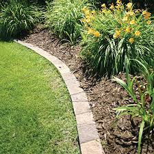 This edging is great for outlining patios, walkways, gardens, and other landscaping designs. Insignia 5 In L X 8 In W X 3 In H Concrete Straight Edging Stone Lowes Com Landscape Edging Landscape Edging Stone Landscape Edging Diy