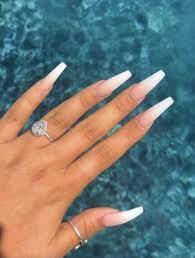 • mountain shaped acrylic nails (also known as stiletto shaped acrylic nails) are getting as popular as coffin shaped nails thanks to their prevalence on red carpets. Best Nail Salons In La Long Acrylic Nails Coffin Ombre Acrylic Nails White Acrylic Nails