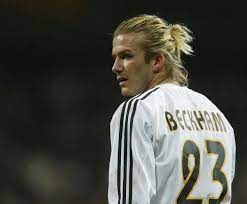 Want hair that looks as good as david beckham's? The Man Bun More Men Sporting Long Hair In Stylish Updo David Beckham Long Hair David Beckham Hairstyle Man Bun