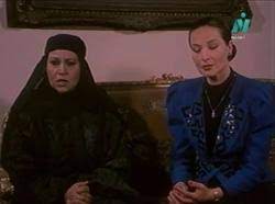معمر القذافي ، رئيس الدولة الليبي ، يلقي خطابه الأول كرئيس للاتحاد الأفريقي في القاعة العامة لمبنى الأمم المتحدة في أديس أبابا، إثيوبيا، خلال قمة الاتحاد الأفريقي الثانية عشرة في 2 فبراير 2009. ÙØªØ­ÙŠØ© Ø·Ù†Ø·Ø§ÙˆÙŠ Ø§Ù„Ø¯Ù‡Ù„ÙŠØ² Ù‚Ø§Ø¹Ø¯Ø© Ø¨ÙŠØ§Ù†Ø§Øª Ø§Ù„Ø³ÙŠÙ†Ù…Ø§ Ø§Ù„Ù…ØµØ±ÙŠØ© ÙˆØ§Ù„ÙÙ†Ø§Ù†ÙŠÙ†