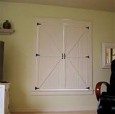 25 Diy Window Covering Tutorials Remodelaholic Diy Interior Shutters Window Coverings Diy Interior Shutters