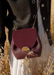 Stjernsund väska kuvertväska ljusbeige 11x25 cm kr mycket vacker och nätt väska att ha på studentbalen eller sök vidare på: Polene Bag N 1 Mini Burgundy