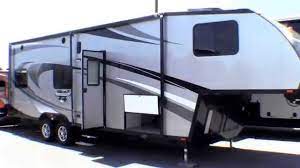Gone are the days when toy haulers were decorated with black and. 2014 Livin Lite Quicksilver 32 Toy Hauler Fifth Wheel Under 6 500 Pounds Youtube