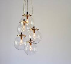 50 Beautiful Globe Pendant Lights From Metal To Glass To Paper