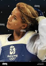 Sumeyye Gulec (L) from Germany loses against Dalia Rivero Contreras from  Venezuela in the 49kg Preliminary Round of 16 of the women's Taekwondo  competition in the USTB Gymnasium at the Beijing 2008