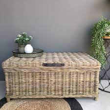 This woven coffee table trunk creates a striking focal point to any living room area while offering the perfect storage solution. Rattan Trunk With Leather Straps Greywash Large Humble Home