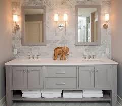 A double vanity by l'epi d'or adds a dose of charm to a small bathroom in french architect jacque grange's paris apartment. Cabinet Bathroom Styling Bathroom Design Beautiful Bathrooms