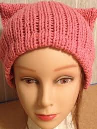 Cats unhappy with flower hats