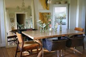 One of the most important, and also most neglected, aspects of the dining room with such a big dining table is the illumination. Large Scale Pieces Give Small Rooms Massive Style