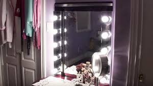 Lay your 3 vanity light strips and frameless mirror down on a big piece of 1/2″ plywood and cut around to create your backing for the entire vanity mirror unit. She Makes The Ultimate Hollywood Vanity With All The Lights Easy And Affordable