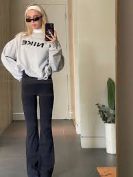 Persia's knit bell bottom leggings are the coolest leggings around. Emma Chamberlain Brought Back Flared Yoga Pants Who What Wear