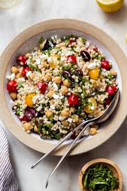 Pour the steamed semolina into a mixing bowl, add the salt and separate the forming couscous with a fork while spraying with a little more water. Israeli Couscous Chickpea Salad Recipe Little Spice Jar