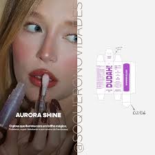 SPOILER 🚨🚨 Aurora Shine @dudah.beauty Uma nova cor de gloss da Dudah  Beauty está chegando, o Aurora Shine. O Aurora Shine é um gloss que ilumina  com um brilho mágico, super hidratante
