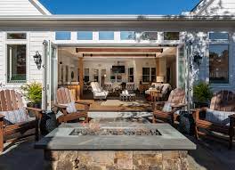 Completed concrete block bar with buffet of fruit lemonade and desserts. Indoor Outdoor Kitchen And Bar With California Doors And Intimate Firepit Patio Butler Landscape Design Garden Design Landscape Architect Athens Ga Oconee County Bogart