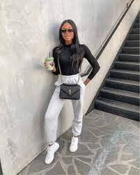 Grey Joggers Black Bodysuit Travel Outfit White Sneakers Ysl College Bag Liketoknow It Liketkit Http Causual Outfits Jogger Outfit Casual Fashion Outfits